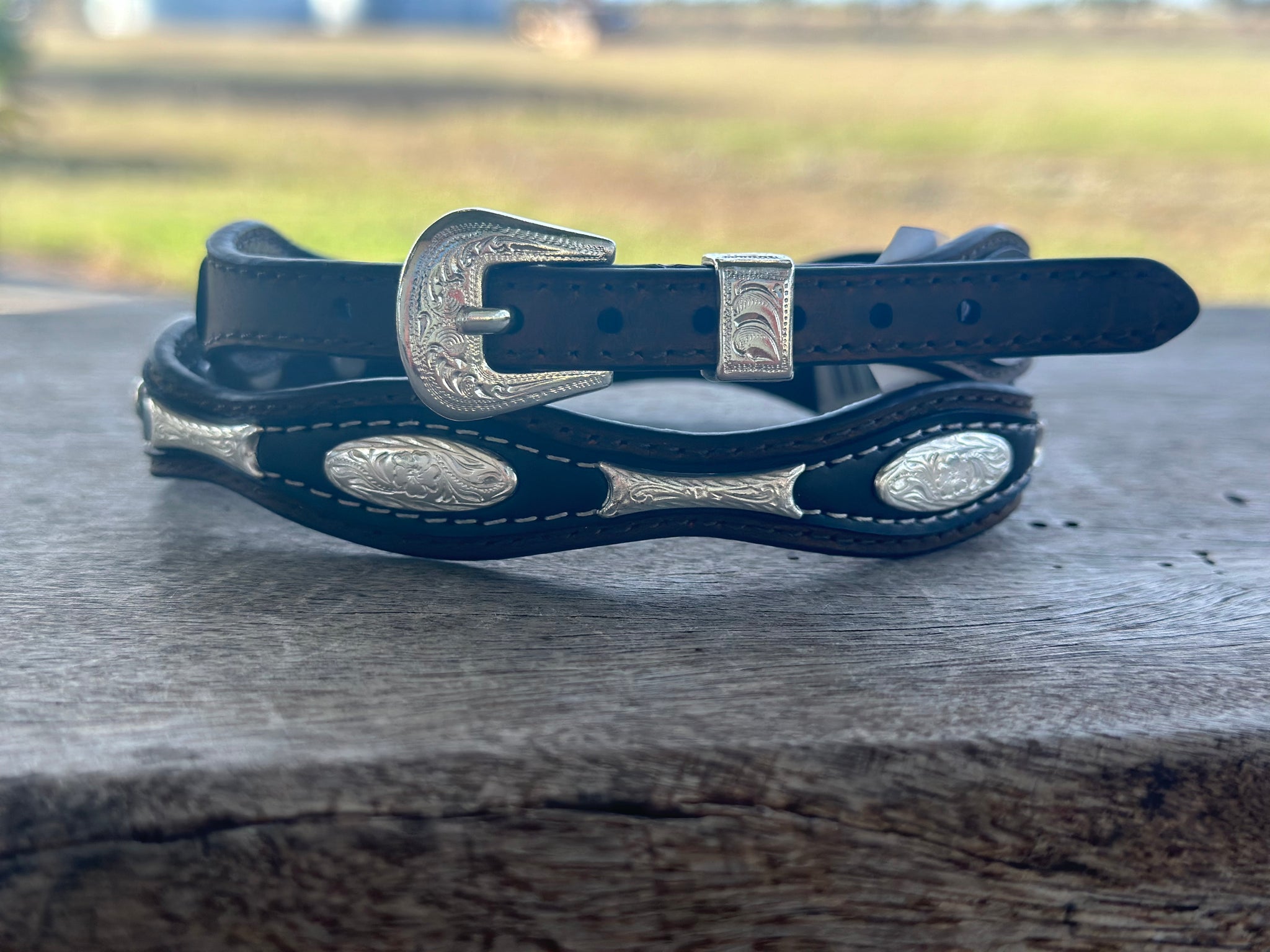 DARK BROWN SCALLOPED CROWN BAND WITH OVAL CONCHOS