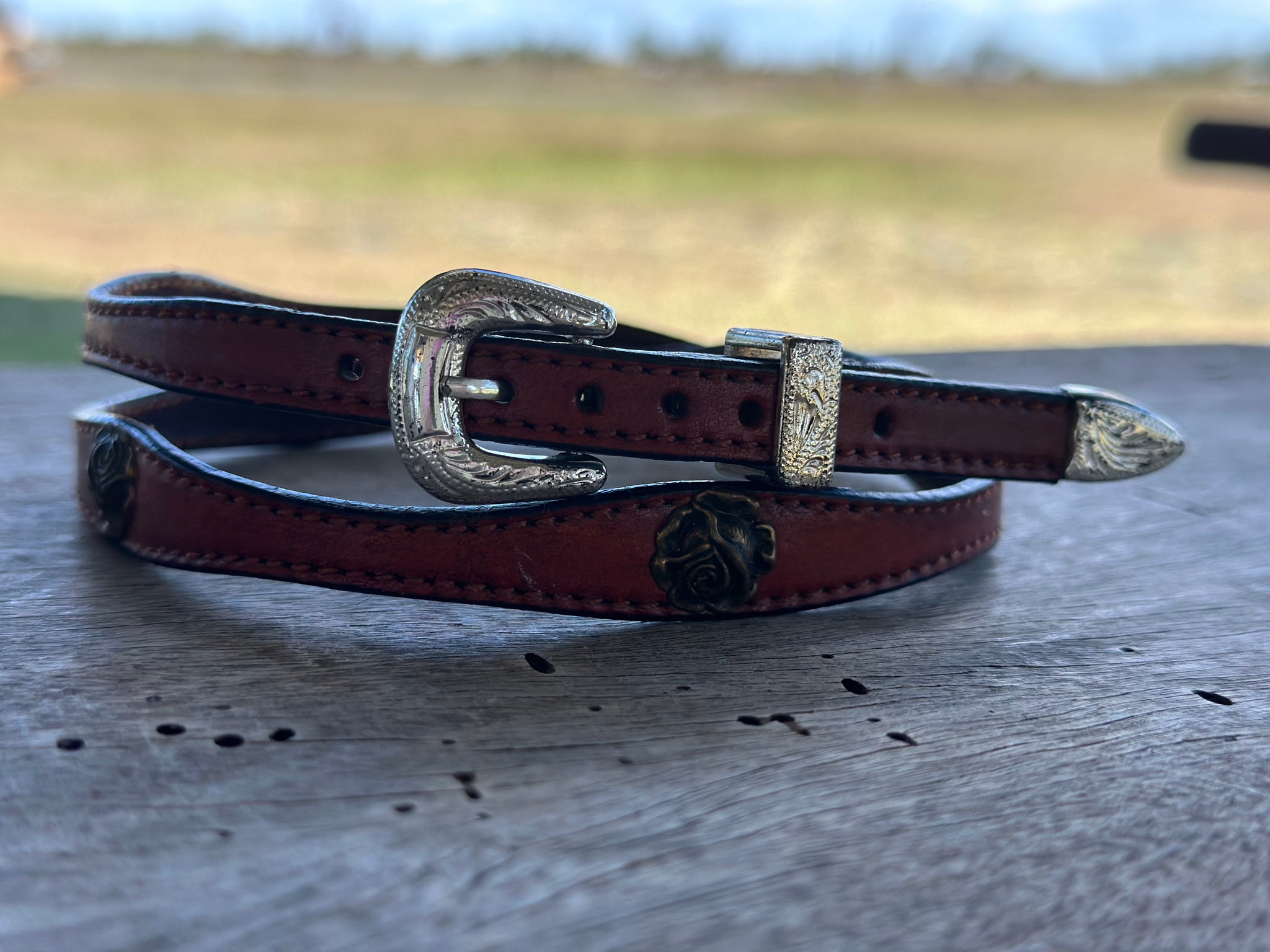 DARK BROWN SCALLOPED LEATHER WITH ROSES