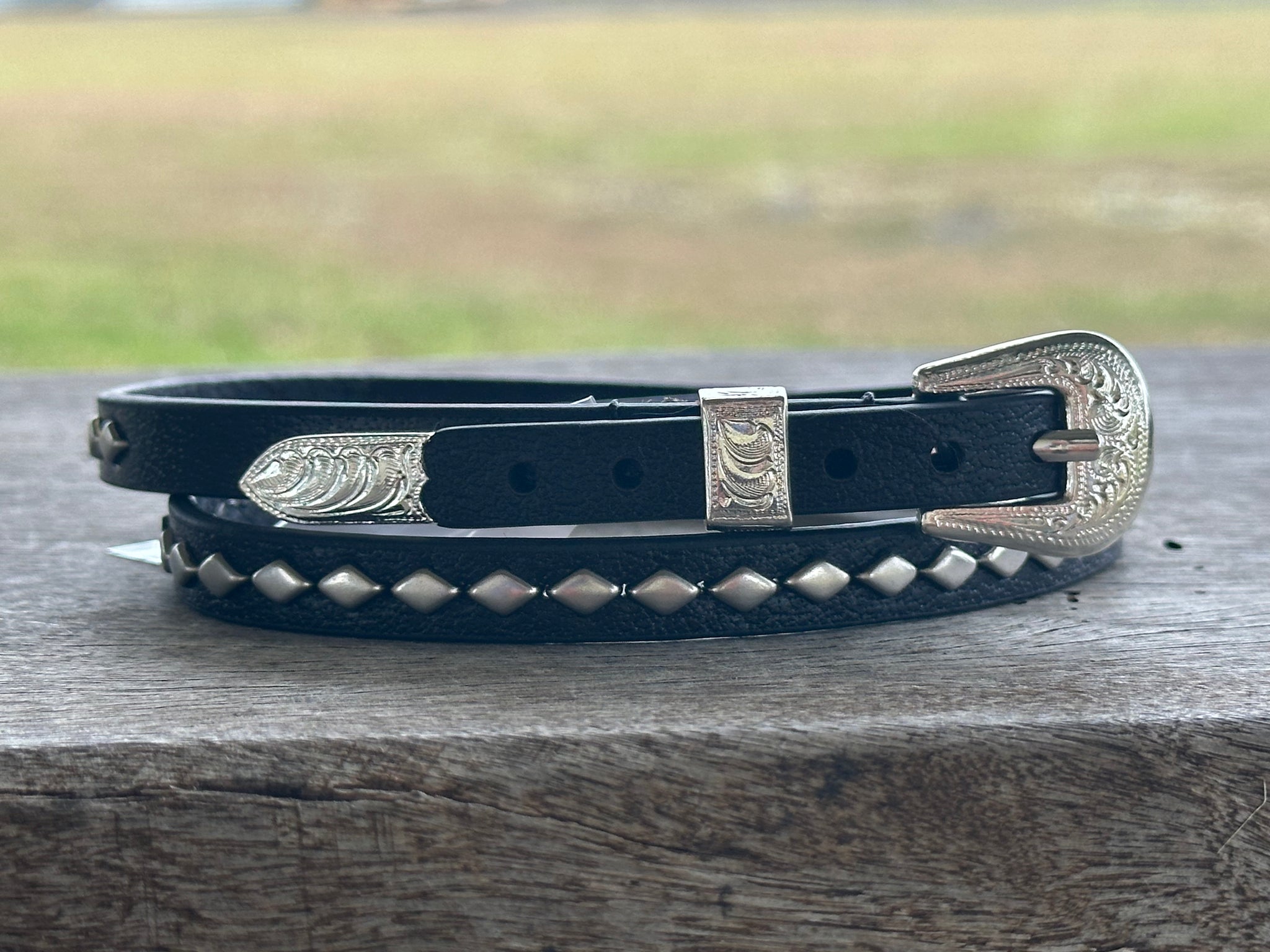 BLACK LEATHER WITH SILVER CONCHOS