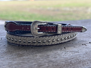 CREAM HIDE WITH  SILVER CONCHOS CROWN BAND