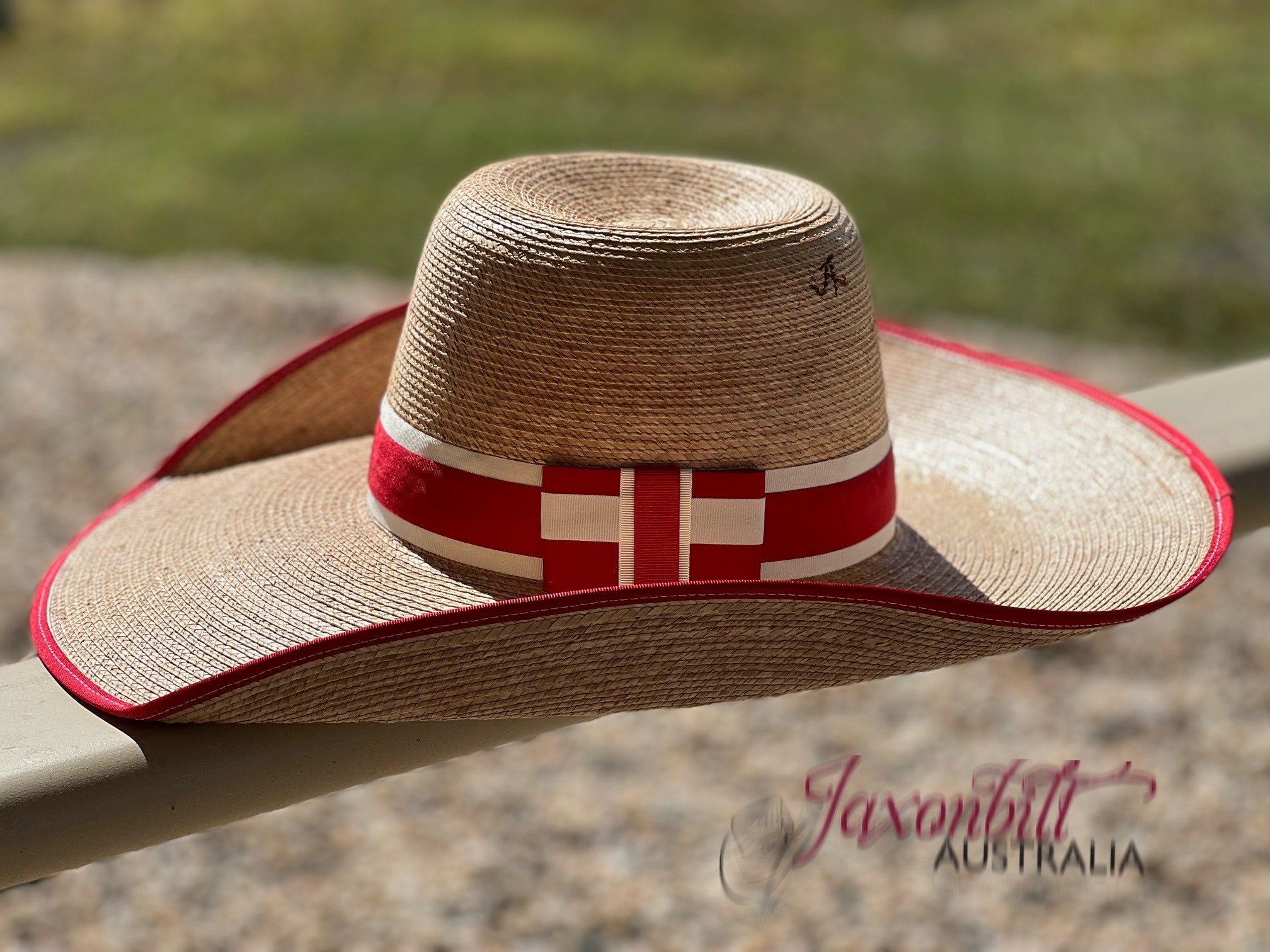 Jaxonbilt_Hats_are_Australian_made_palm_leaf_hats_and_crossbred_hats_for_cowgirls_and_cowboys_with_wide_brims_for_sun_protection_5”_brim_trim_on_edge_wide_crown_band_cool_hand_luke_shape_dark_oak_palm