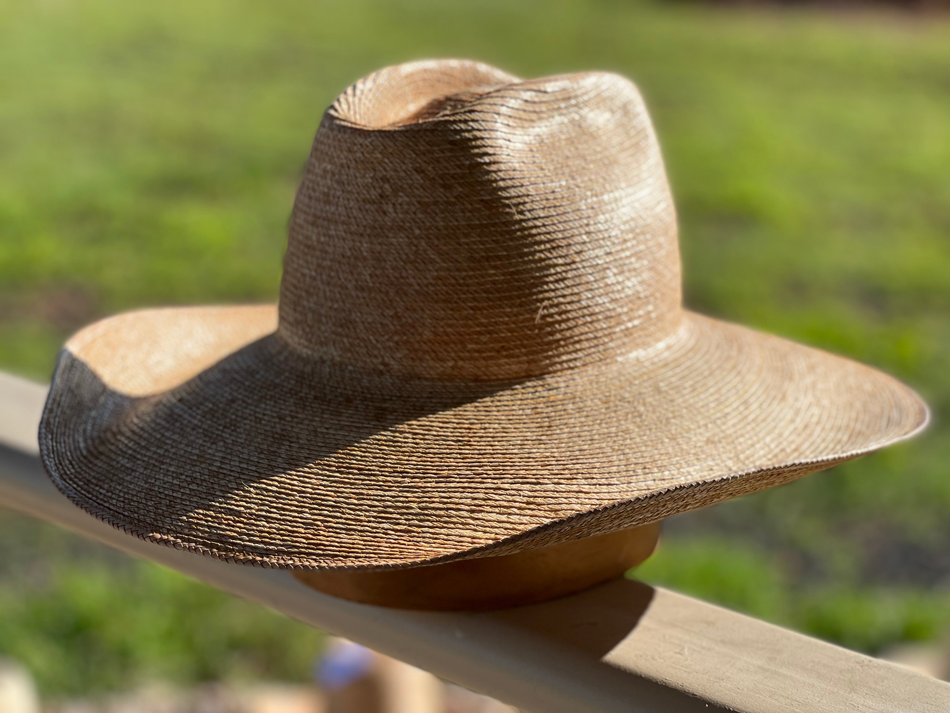 Jaxonbilt_Hats_are_Australian_made_palm_leaf_hats_and_crossbred_hats_for_cowgirls_and_cowboys_with_wide_brims_for_sun_protection_5”_brim_trim_on_edge_wide_crown_band_cattleman_shape_dark_oak_5”_brim