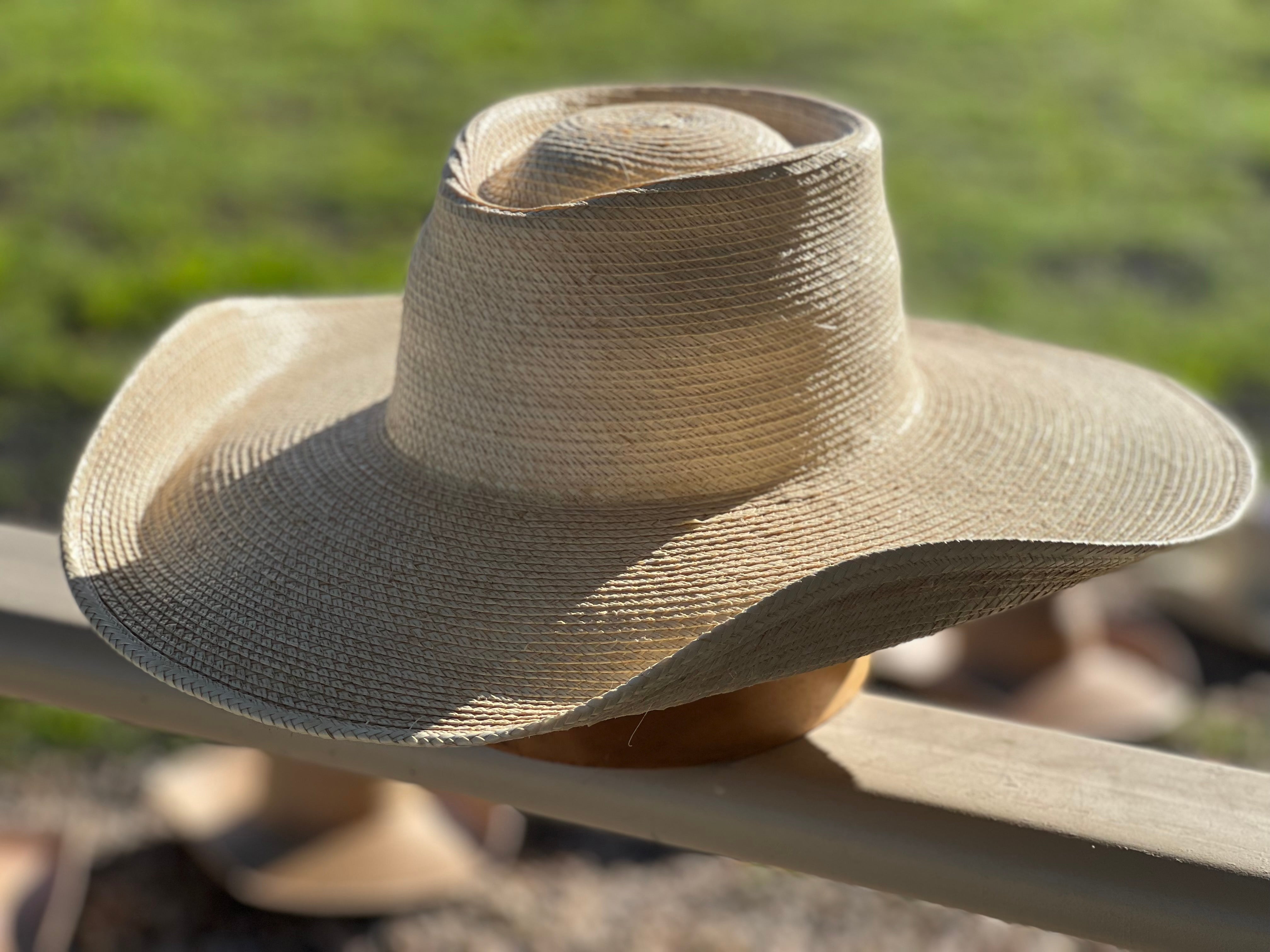 Jaxonbilt_Hats_are_Australian_made_palm_leaf_hats_and_crossbred_hats_for_cowgirls_and_cowboys_with_wide_brims_for_sun_protection_5”_brim_trim_on_edge_wide_crown_band_tear_drop_shape_light_palm_5”_brim
