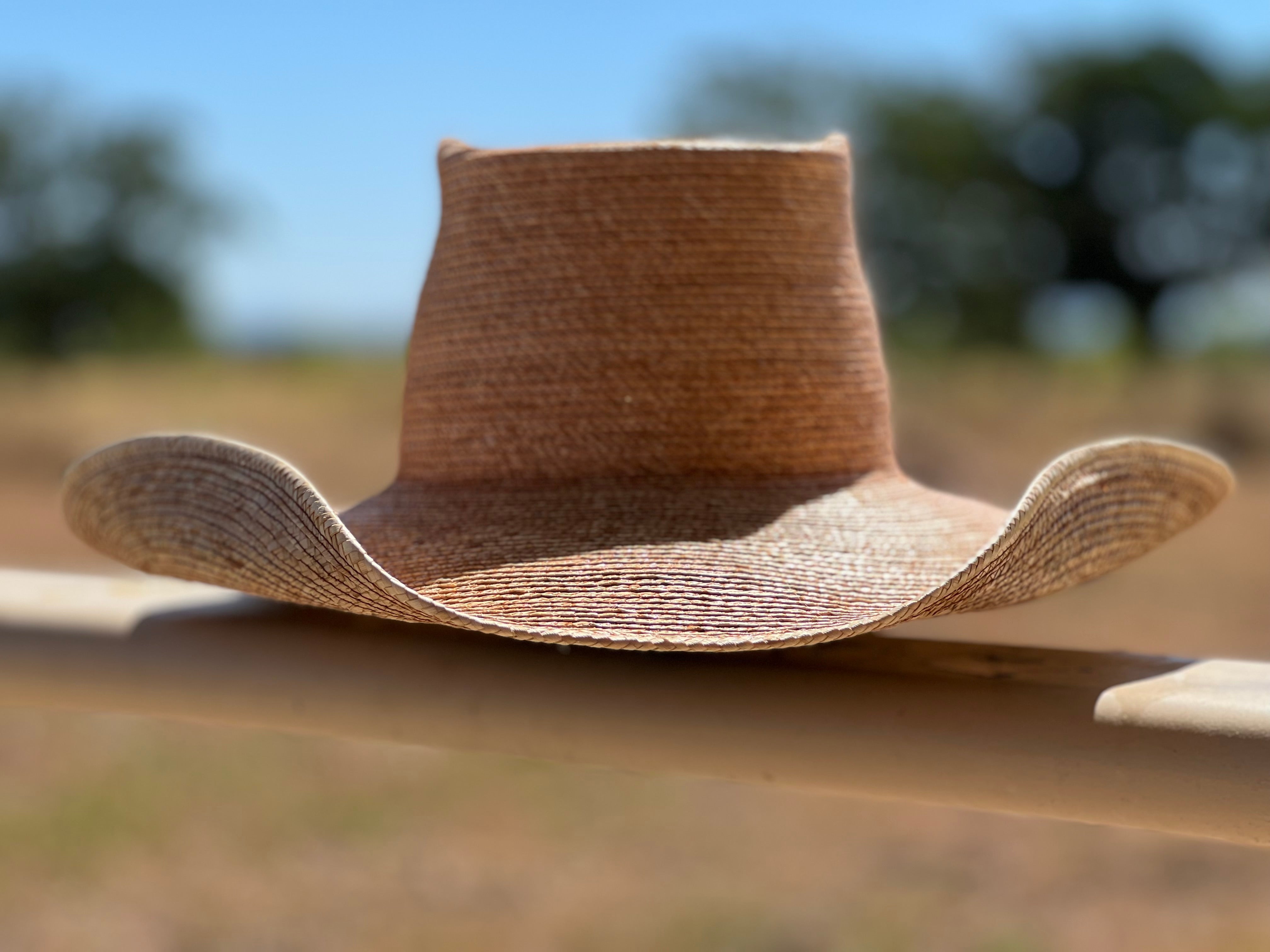 Jaxonbilt_Hats_are_Australian_made_palm_leaf_hats_and_crossbred_hats_for_cowgirls_and_cowboys_with_wide_brims_for_sun_protection_5”_brim_trim_on_edge_wide_crown_band_curly_brim_shape_dark_oak_5”_brim