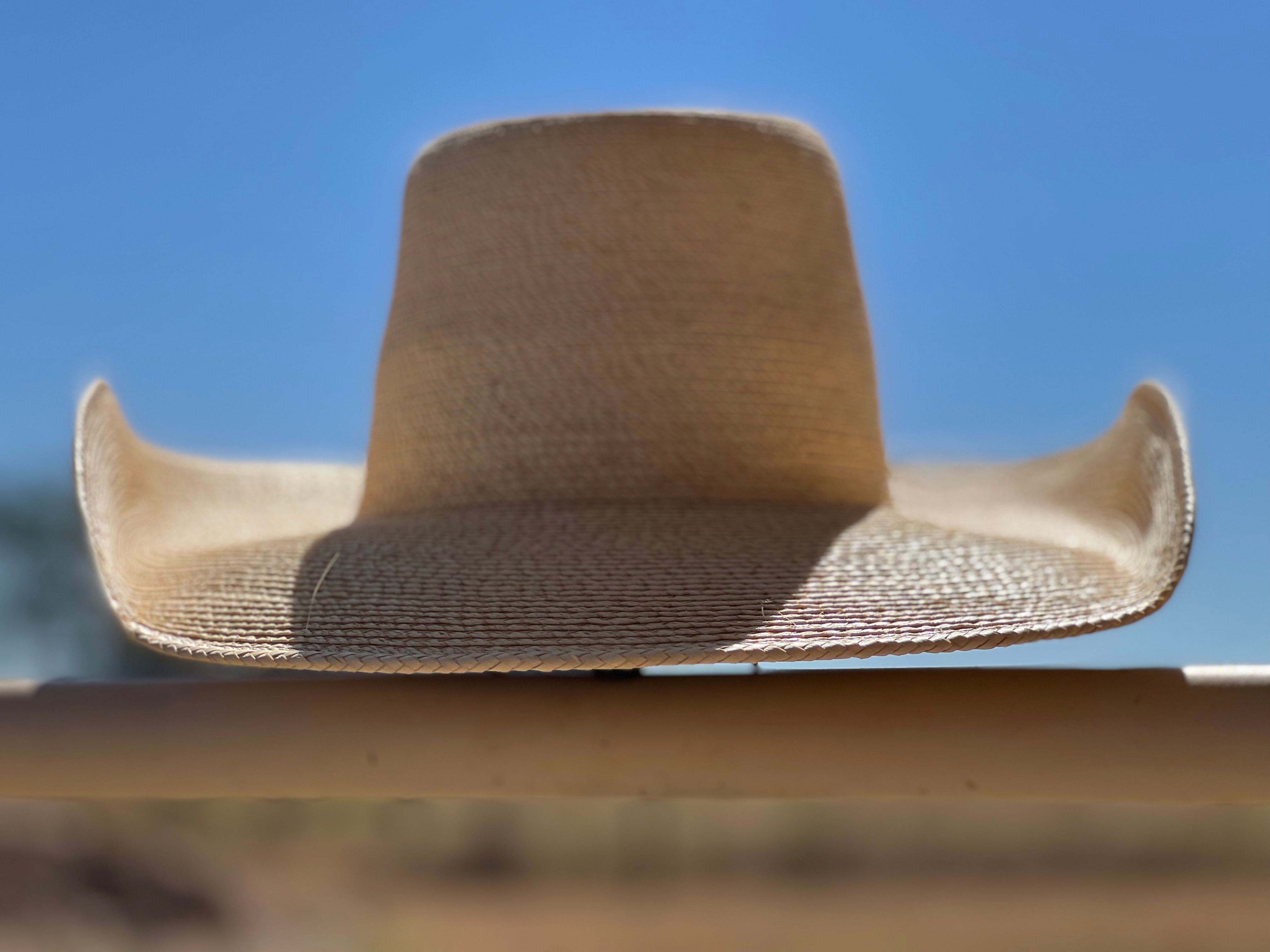 Jaxonbilt_Hats_are_Australian_made_palm_leaf_hats_and_crossbred_hats_for_cowgirls_and_cowboys_with_wide_brims_for_sun_protection_5”_brim_trim_on_edge_wide_crown_band_cool_hand_luke_shape_brim_light_palm_5”_brim